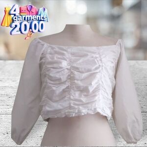 It's pink, white ruched top with elastic in back, puffy sleeves crop top size L